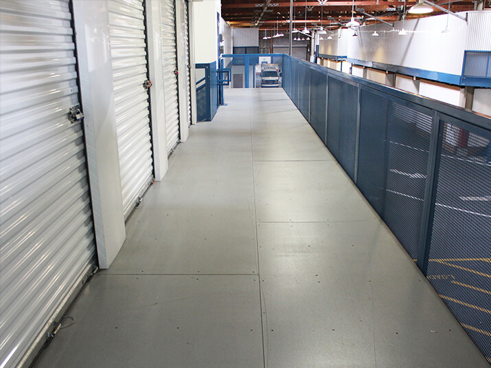 Self-storage mezzanine with ResinDek